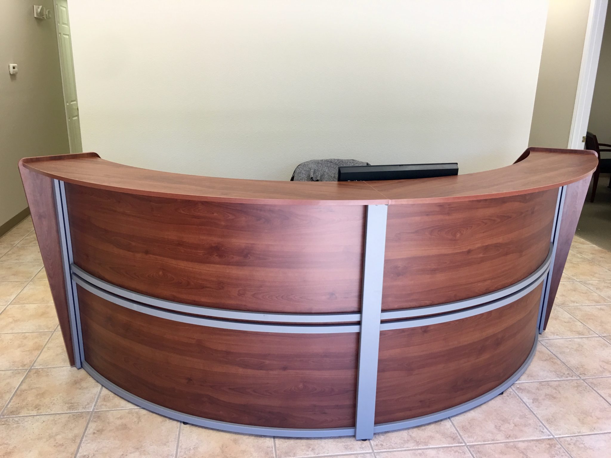 Half-Circle Reception Desk with Brushed Silver Trim